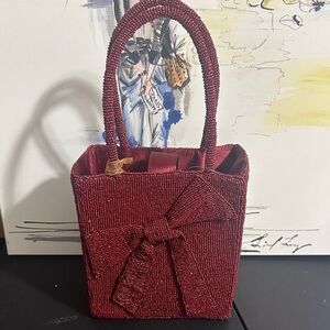 From India to you maroon bow beaded handle bag